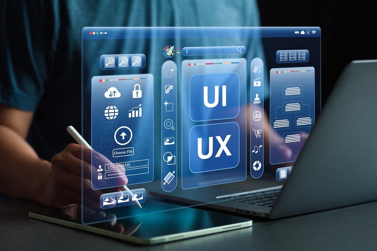 Developers working with interface concepts and code on virtual screens